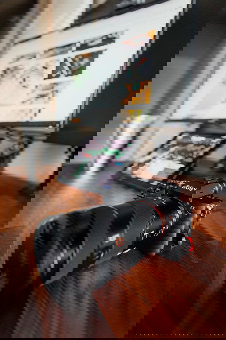 Sony A7R on a table in front of a computer screen